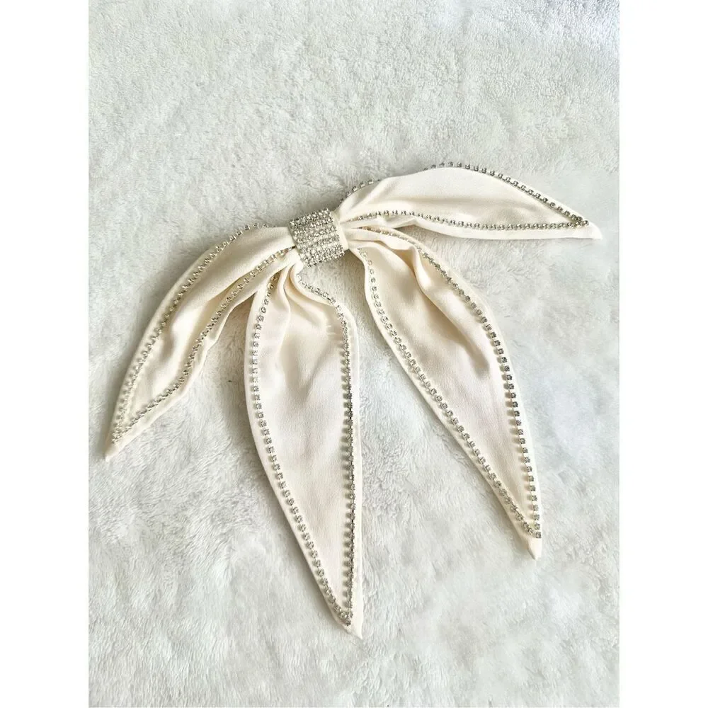 Off white rhinestone embellished hair bow